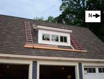 roof showing placement of the roof brackets, planks and ladders