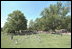 The Uniondale Little League Sluggers of Uniondale, N.Y., battled for bases with the 6&11 Little League Sluggers from Trenton, N. J., on a quiet, sunny corner of the White House South Lawn Sunday, May 5, 2002.