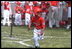 President George W. Bush attends a Tee Ball on the South Lawn game between the Cardinals and the South Berkeley Little League Braves from Inwood, West Virginia. June 23, 2002.