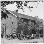U.S. Christian Commission Office, Richmond, Va., April, 1865." Shows a group including blacks in front of a building
