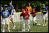 A player from the West University Little League Challengers from Houston, Texas, heads for homeplate to score a run, Sunday, July 24, 2005, during a Tee Ball game on the South Lawn of the White House.