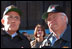 Guided by then-Mayor Rudolph Giuliani (center), Vice President Dick Cheney and Lynne Cheney tour ground zero and talk with rescue workers in New York City Oct. 18, 2001. "The people of New York have seen appalling tragedy and suffering. This afternoon I was at ground zero and I saw the damage at close range. It is staggering; almost beyond a person's ability to describe," the Vice President said at the 56th Annual Alfred E. Smith Memorial Foundation Dinner. 