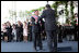 President Oscar Arias is embraced by outgoing President Abel Pacheco during the inaugural at the Estadio Nacional in San Jose, Costa Rica, Monday, May 8, 2006.