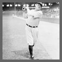 Babe Ruth swinging a bat.