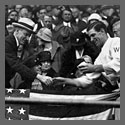 Manager Stanley Harris, in the grandstand, presents President Coolidge with the baseball used to open the 1924 World Series