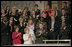 The chamber audience applauds Sgt. Tommy Rieman as the President recognizes him during his State of the Union Address at the U.S. Capitol Jan. 23, 2007. "He was shot in the chest and arm, and received shrapnel wounds to his legs -- yet he refused medical attention, and stayed in the fight. He helped to repel a second attack, firing grenades at the enemy's position,” explained the President. "For his exceptional courage, Sergeant Rieman was awarded the Silver Star. And like so many other Americans who have volunteered to defend us, he has earned the respect and the gratitude of our entire country."