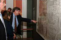 A visitor points out the word "America" on the Waldseemüller map. 