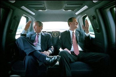 En route to speak at University of Toledo's Savage Hall, Presidents Bush and Fox wave to onlookers as they tour through the streets of America's heartland. "I can feel right here the enthusiasm, the warm welcome, which you generously are giving to us. Your welcome has moved me," said President Fox during his remarks at the university.