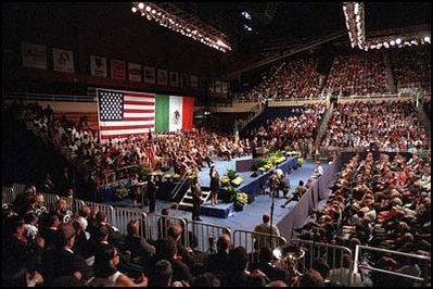 Speaking in Spanish and English, President Fox addresses a crowd of students, faculty and community members at the University of Toledo. "(The United States and Mexico) are partners to work together, building a better future for both of our nations," said the Mexican leader in his remarks.