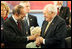 Vice President Dick Cheney speaks with European Union Foreign Policy Chief Javier Solana, Wednesday, May 4, 2006 at the Vilnius Conference 2006 in Vilnius, Lithuania. The conference brings together delegations from the Baltic and Black Sea regions that are committed to the advancement of democracy and dedicated to working together to reinforce common values and regional interests. 