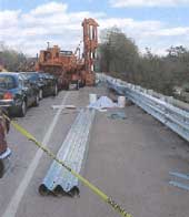 Location of victims and the guardrail following the incident. The truck had been driven back to the right shoulder and parked following the incident.