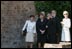 Mrs. Laura Bush is escorted on a tour outside the City of Stralsund Archives in Stralsund, Germany, Thursday, July 13, 2006, by Dr. Hans-Joachim Hacker, director of the City of Stralsund Archives.