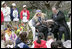 Children book authors Mary Pope Osborne and her husband Will Osborne read aloud to an ethusiastic crowd of young readers from her book, "American Tall Tales," Monday, April 9, 2007, during the 2007 White House Easter Egg Roll on the South Lawn. White House photo by Shealah Craighead