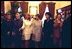 Laura Bush stands between the First Lady of Poland Jolenta Kwasneiska, third right, and First Lady of the Czech Republic , Dagmar Havlova, third left, as other spouses to NATO heads of state line up for a photo-op prior to a luncheon hosted by Dagmar Havlova at a Presidential retreat outside Prague. 