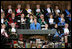 Mrs. Laura Bush is applauded as she addresses the audience at the University of Turin in Turin, Italy, Feb. 11, 2006, where she announced a U.S. book donation to the university.