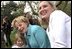 Visiting one-on-one with many families and children, Lynne Cheney poses for pictures on the South Lawn at the White House Easter Egg Roll Monday, April 21, 2003. 