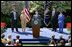 President George W. Bush discusses the economy in the Rose Garden Tuesday, April 15, 2003. Accompanying President Bush on stage are, from left, small business owners Tim Barrett, Christine Bierman, Frank Fillmore and Karla Aaron.