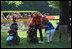 With coaches and a big furry mascot on hand, the bases were always loaded with activity during the third Tee Ball game on the South Lawn on Sunday, July 15, 2001.