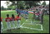 President George W. Bush starts the second Tee Ball game on the South Lawn on Sunday, June 3, 2001.