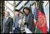 President George W. Bush stands with President Hamid Karzai of Afghanistan, Mrs. Laura Bush and Secretary of State Condoleezza Rice during welcoming ceremonies Wednesday, March 1, 2006, in Kabul.