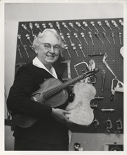 [Virginia Apgar with viola, violin, and instrument-making tools]. [ca. 1960s].