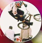 Bicycle stunt event at the Kentucky Derby Festival, detail from poster. Photo by Marvin Young, 1999.