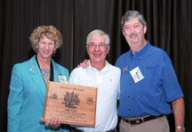 Photograph: Jim Bardwell (middle), Patoka Hills Chapter President accepting Answer the Call Volunteer award from Gail Tunberg, Answer the Call Program Coordinator (left) and Rocky Evans, Quail Unlimited President.