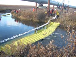 River booming and skimmer exercise, Prudhoe Bay, Alaska, Summer 2004.  Photo by Alaska Clean Seas.