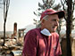 John Rossi helps friends recover from the devastating October 2007 fire that destroyed their home.