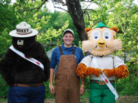 (image) OA National Chief Jake Wellman with Smokey and Woodsy