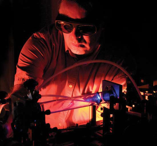 George Rodriguez of the Center for Integrated Nanotechnologies adjusts and monitors the argon gas pressure inside two-color plasma ionization gas cells.