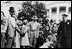 The grandchildren of President Eisenhower, David and Anne, roll eggs on the South Lawn of The White House in 1953, the same year the Egg Roll was reintroduced as White House tradition. 