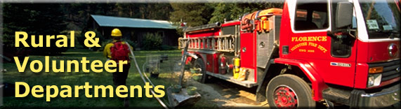 Rural & Volunteer Fire Departments header with photo of volunteer fire department doing structure protection in the wildland/urban interface.