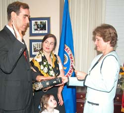 Eric Dreiband being sworn in by Chair Cari M. Dominguez