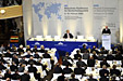 Attendees of the 44th Munich Conference on Security Policy listen as U.S. Defense Secretary Robert M. Gates delivers a speech on security threats posed by terrorists to European nations in Munich, Germany, Feb. 10, 2008.