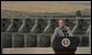 President George W. Bush discusses salmon restoration from Ice Harbor Locks and Dam in Burbank, Wash., Friday, August 22, 2003. "I was pleased to see the incredible care that goes in to protecting the salmon that journey up the river. It's an important message to send to people, it seems like to me, that a flourishing salmon population is a vital part of the vibrancy of this incredibly beautiful part of our country," said the President in his remarks about his tour of the facility.  White House photo by Paul Morse