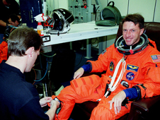 Astronaut Michael Foale suits up before the STS-103 launch.