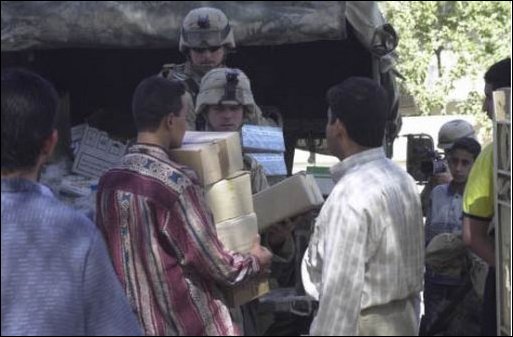 Soldiers from Civil Affairs attached to the 101st Airborne Division (Air Assault) deliver medical supplies to clinics in Baghdad, Iraq, April 17, 2003. 