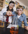 Teenage with science beaker.