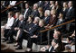 Mrs. Laura Bush, first row-center, joins former President Jimmy Carter and his wife, Rosalynn; former President Bill Clinton, and his wife, Hillary Clinton; Mrs. Nancy Reagan; Caroline Kennedy Schlossberg, her husband Edwin Schlossberg; Mrs. Barbara Bush; Susan Ford Bales, daughter of former President Gerald R. Ford; and Patricia "Tricia" Nixon Cox and her husband, Edward Cox, upper-right, at the funeral service for former first lady Lady Bird Johnson Saturday, July 14, 2007, at the Riverbend Centre in Austin, Texas. White House photo by Shealah Craighead