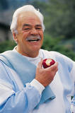Man eating an apple - Click to enlarge in new window.