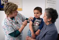 Boy receives vaccination