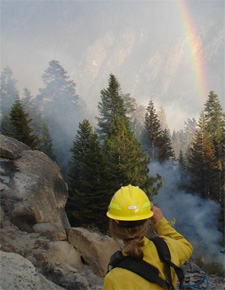 Fire ecologist monitoring fire.