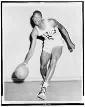Bill Russell, wearing Boston Celtics uniform, dribbling basketball, 1958