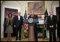 President George W. Bush nominates John Negroponte as Deputy Secretary of State, left, and Vice Admiral Mike McConnell as Director of National Intelligence during an announcement in the Roosevelt Room Friday, Jan. 5, 2007. Secretary of State Condoleezza Rice is pictured at left. White House photo by Paul Morse