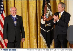 President George W. Bush applauds former Prime Minister John Howard after presenting the Australian leader with the 2009 Presidential Medal of Freedom during ceremonies Tuesday, Jan.13, 2009, in the East Room of the White House. White House photo by Chris Greenberg