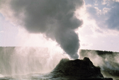 A steaming geyser in Yellowstone National Park, Idaho, Montana, Wyoming