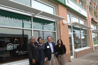 Comptroller Dugan with staff members of Park National Bank's Community Savings Center.