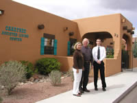 Three employees of Carefree Assisted Living, in Cottonwood, AZ, take a break from serving 22 elderly residents.  Carefree received gap financing from Arizona MultiBank CDC.