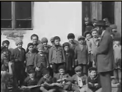 Prewar Jewish life, early 1930s. Young children reciting a lesson outdoors. Munkacs, Czechoslovakia (later Hungary).